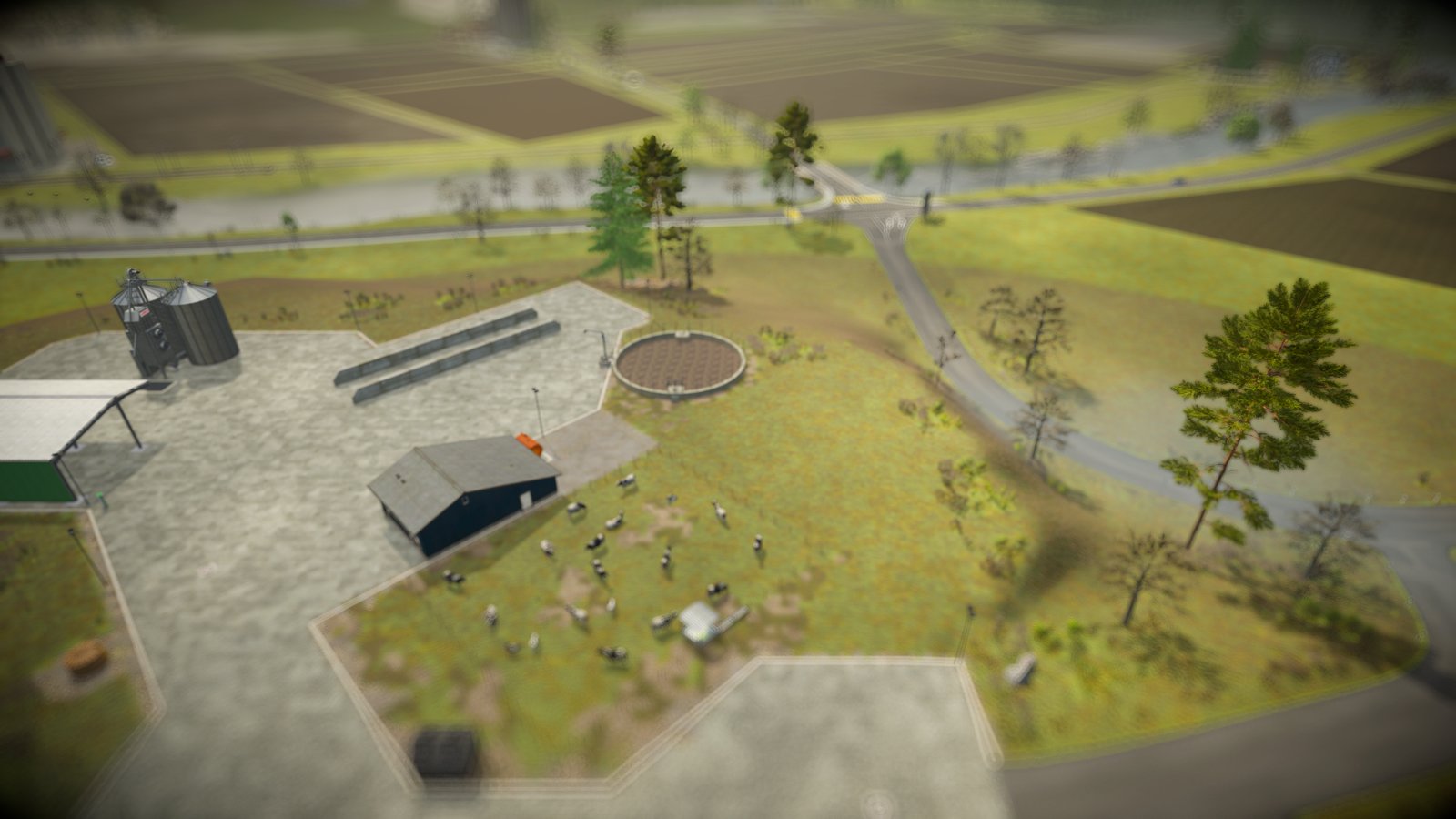 A farmyard from a raised static camera, with the miniature tilt-shift look